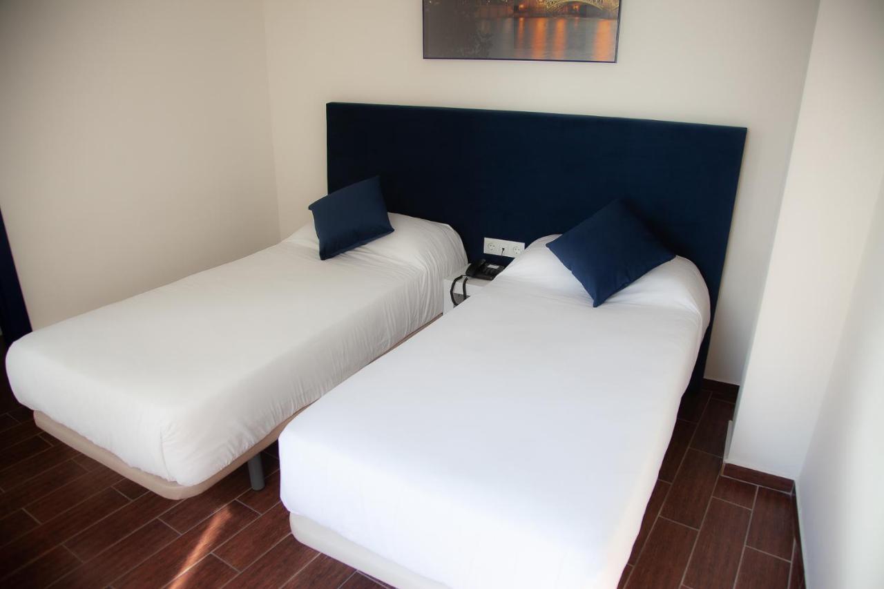 Tweepersoonskamer met 2 Aparte Bedden