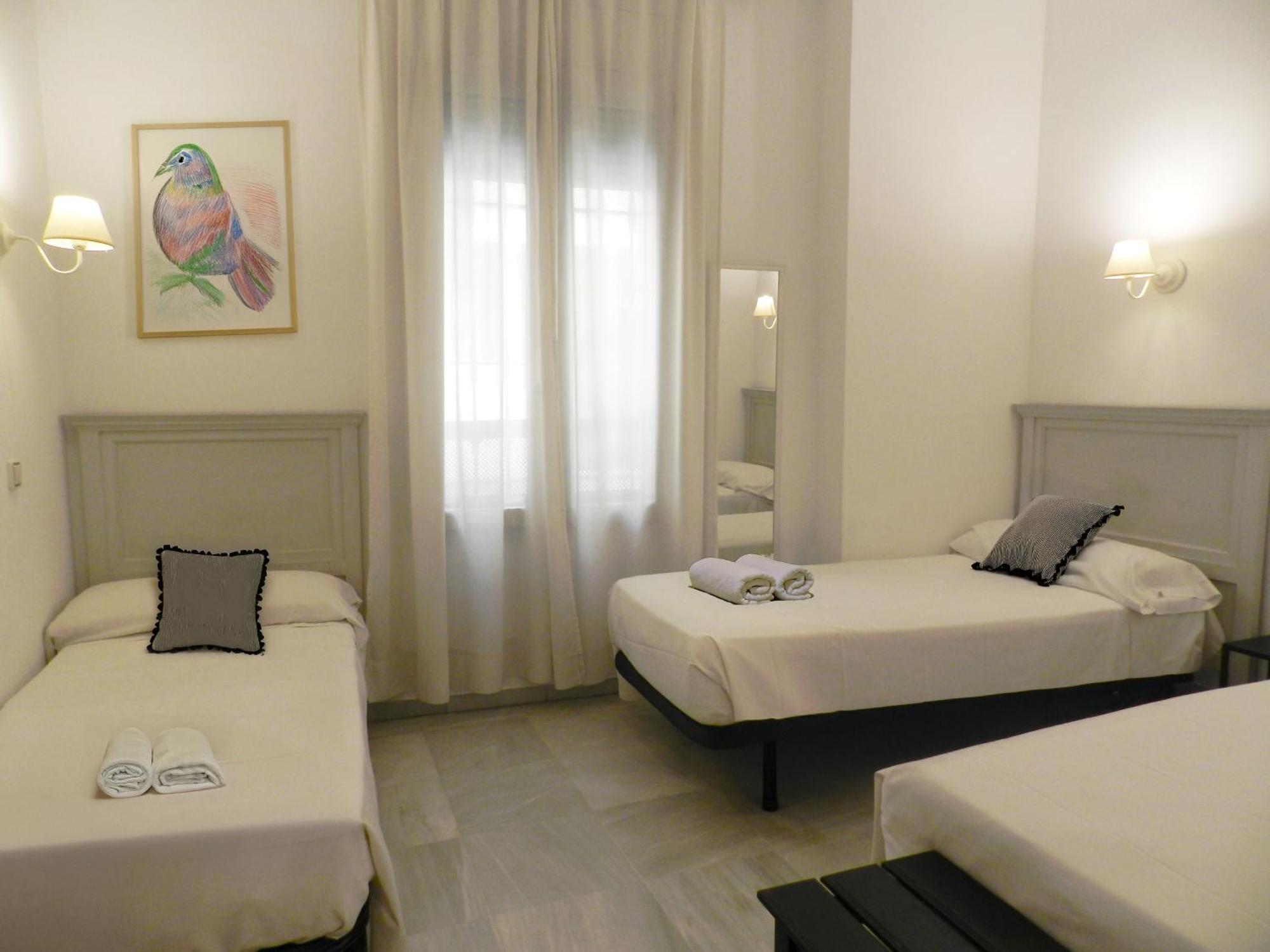 DOUBLE EXTRA BED 3 INDIVIDUAL BEDS